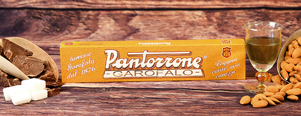 Torrone alle Mandorle, farcito al Pan di Spagna, inzuppato al liquore Benevento, ricoperto al Cioccolato
Brevettato l'11 Marzo 1967 n. 223385