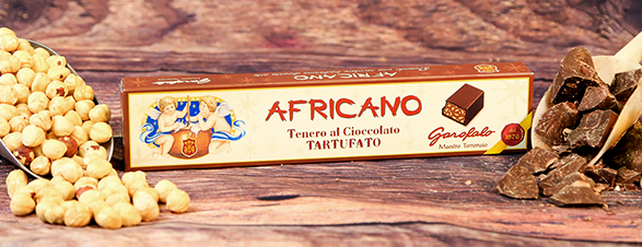 Torrone Tenero al Cioccolato Fondente con Nocciole e Torrone in Granella, aromatizzato al Rhum (Ricetta Storica)